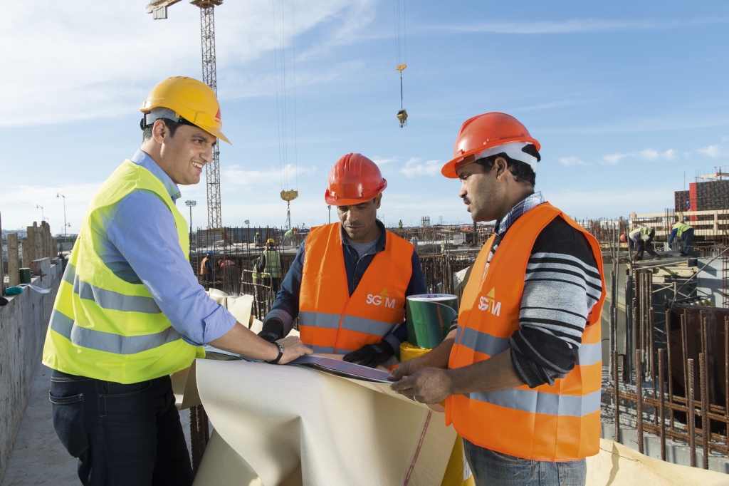 Sika engineer consulting workers on construction site in Morocco